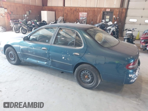 1996 Nissan Altima XE with VIN 1N4BU31D4TC139105, listed as a IAAI auction lot 40241213 with 115,817 mi miles and . Bid and sale history available at DreamBid. Image 3.