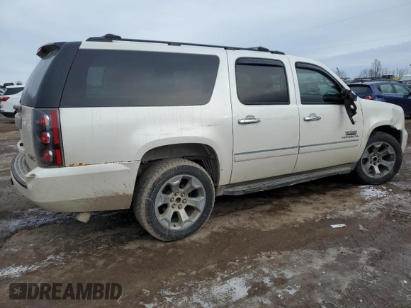 2011 GMC Yukon XL SLT with VIN 1GKS1KE06BR217663, listed as a Copart auction lot 43960245 with 215,703 mi miles and Salvage Title. Bid and sale history available at carsss.com. Image 3.