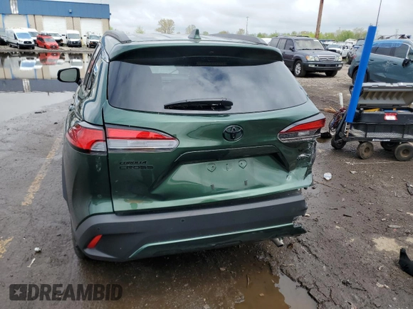 2022 Toyota Corolla Cross XLE with VIN 7MUDAABG6NV006829, listed as a Copart auction lot 55626965 with 23,187 mi miles and Salvage title. Bid and sale history available at DreamBid. Image 6.