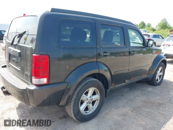 2008 Dodge Nitro SXT z VIN 1D8GU28K08W151127, wystawiony jako IAAI lot #42502070 z przebiegiem 145 972 mil mil oraz . Historia ofert i sprzedaży dostępna na DreamBid. Obrazek 4.