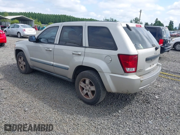 2007 Jeep Grand Cherokee Laredo z VIN 1J8GR48K57C605912, wystawiony jako IAAI lot #42323050 z przebiegiem 210 615 mil mil oraz . Historia ofert i sprzedaży dostępna na DreamBid. Obrazek 3.