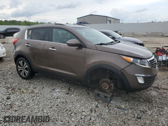 2012 Kia Sportage EX z VIN KNDPC3A25C7187402, wystawiony jako Copart lot #57853615 z przebiegiem 175 903 mil mil oraz Szkoda całkowita • Salvage title. Historia ofert i sprzedaży dostępna na DreamBid. Obrazek 4.