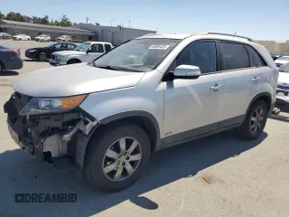 2013 Kia Sorento LX with VIN 5XYKTDA69DG409771, listed as a Copart auction lot 60668485 with 192,978 mi miles and Salvage title. Bid and sale history available at DreamBid. Image 1.