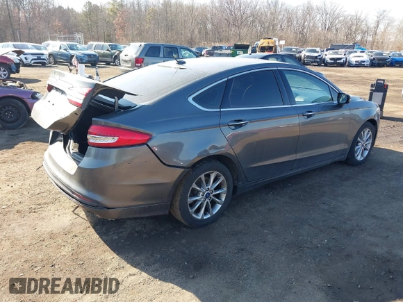 2017 Ford Fusion SE z VIN 3FA6P0HDXHR321008, wystawiony jako IAAI lot #41620779 z przebiegiem 110 116 mil mil oraz . Historia ofert i sprzedaży dostępna na DreamBid. Obrazek 4.
