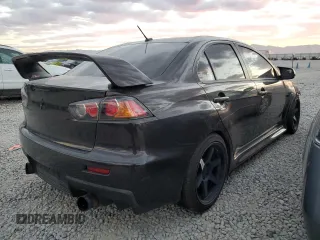 2014 Mitsubishi Lancer Evolution GSR with VIN JA32W8FV1EU014884, listed as a Copart auction lot 72887404 with 0 mi miles and Salvage Title. Bid and sale history available at carsss.com. Image 3.
