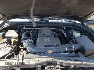 2005 Nissan Xterra S z VIN 5N1AN08W55C611593, wystawiony jako Copart lot #57780103 z przebiegiem 204 801 mil mil oraz Szkoda całkowita • Salvage title. Historia ofert i sprzedaży dostępna na DreamBid. Obrazek 12.
