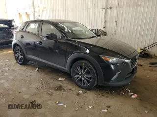 2018 Mazda CX-3 Touring with VIN JM1DKFC70J0316975, listed as a Copart auction lot 48657905 with 76,240 mi miles and Salvage Title. Bid and sale history available at carsss.com. Image 4.