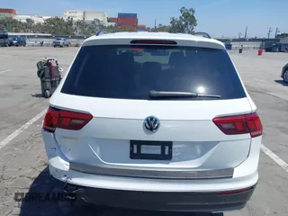 2019 Volkswagen Tiguan S with VIN 3VV1B7AX1KM101407, listed as a IAAI auction lot 42032761 with 51,868 mi miles and . Bid and sale history available at DreamBid. Image 16.