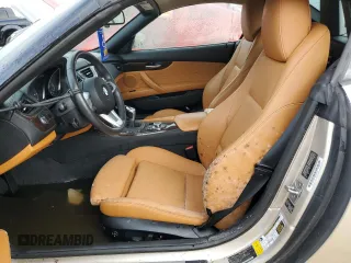 2012 BMW Z4 sDrive35i with VIN WBALM7C5XCE384505, listed as a Copart auction lot 74933904 with 0 mi miles and Salvage Title. Bid and sale history available at carsss.com. Image 7.