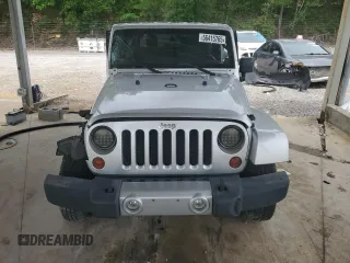 2011 Jeep Wrangler Sahara with VIN 1J4AA5D13BL546742, listed as a Copart auction lot 56415765 with 60,454 mi miles and Salvage title. Bid and sale history available at DreamBid. Image 5.
