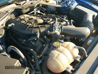 2017 Ford Mustang V6 z VIN 1FATP8EM7H5230609, wystawiony jako IAAI lot #41466675 z przebiegiem 25 841 mil mil oraz . Historia ofert i sprzedaży dostępna na DreamBid. Obrazek 19.