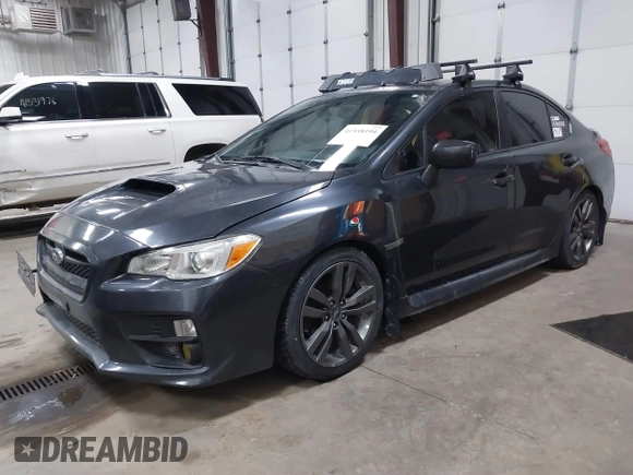 2016 Subaru WRX Premium with VIN JF1VA1E69G8801517, listed as a IAAI auction lot 41558194 with 118,332 mi miles. Bid and sale history available at carsss.com. Image 2.