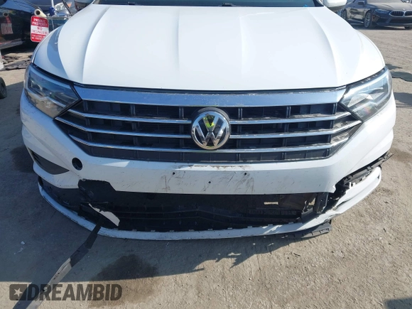 2019 Volkswagen Jetta S with VIN 3VWN57BU4KM177874, listed as a IAAI auction lot 42386870 with 102,334 mi miles and . Bid and sale history available at DreamBid. Image 6.