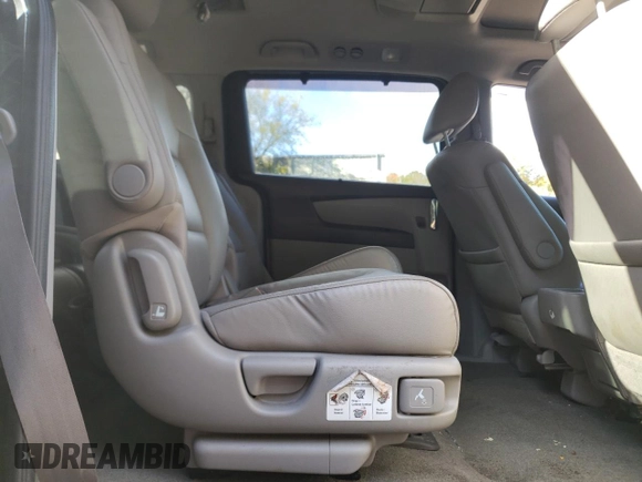 2014 Honda Odyssey Touring z VIN 5FNRL5H98EB512144, wystawiony jako Copart lot #69987533 z przebiegiem 184 231 mil mil oraz Szkoda całkowita • Salvage title. Historia ofert i sprzedaży dostępna na DreamBid. Obrazek 11.