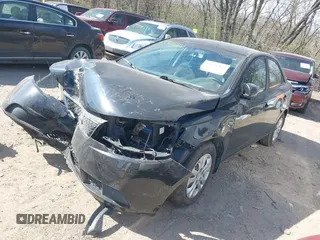 2011 Kia Forte EX with VIN KNAFU4A22B5459846, listed as a IAAI auction lot 39011262 with 201,154 mi miles. Bid and sale history available at carsss.com. Image 2.