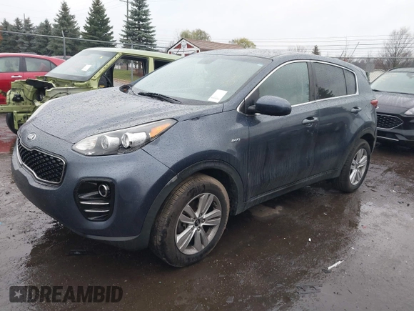 2017 Kia Sportage LX with VIN KNDPMCAC8H7217649, listed as a IAAI auction lot 40843857 with 146,881 mi miles and . Bid and sale history available at carsss.com. Image 2.