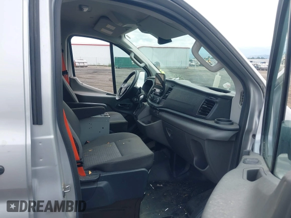 2020 Ford Transit Cargo z VIN 1FTYE1Y80LKB53684, wystawiony jako IAAI lot #42556377 z przebiegiem 102 801 mil mil oraz . Historia ofert i sprzedaży dostępna na DreamBid. Obrazek 5.