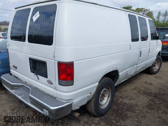 2003 Ford Econoline Cargo with VIN 1FTNE24223HC04321, listed as a IAAI auction lot 42015261 with 183,098 mi miles. Bid and sale history available at carsss.com. Image 4.