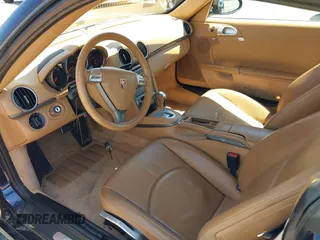 2007 Porsche 718 Cayman z VIN WP0AA29837U762585, wystawiony jako IAAI lot #42201028 z przebiegiem 58 563 mil mil oraz . Historia ofert i sprzedaży dostępna na DreamBid. Obrazek 8.