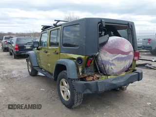 2008 Jeep Wrangler Unlimited X with VIN 1J4GA39158L529523, listed as a IAAI auction lot 41979992 with 304,641 mi miles and . Bid and sale history available at DreamBid. Image 3.