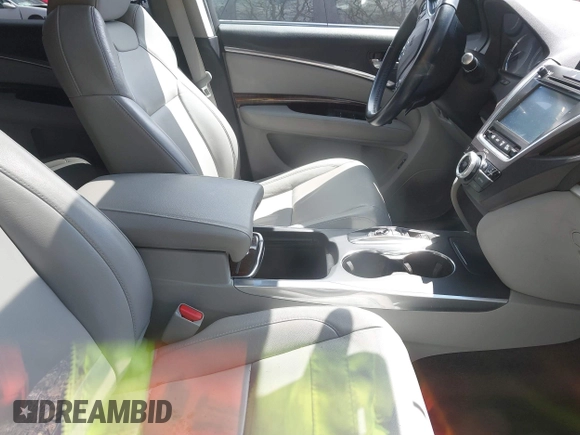 2018 Acura MDX Technology with VIN 5J8YD4H57JL005535, listed as a IAAI auction lot 42027222 with 91,082 mi miles and . Bid and sale history available at DreamBid. Image 5.