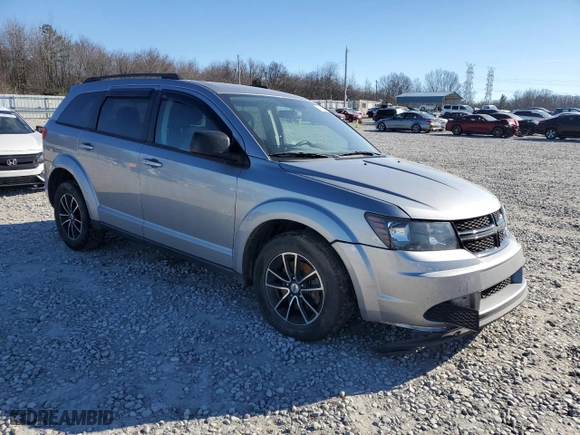 2018 Dodge Journey SE with VIN 3C4PDCAB9JT243122, listed as a Copart auction lot 87483064 with 132,319 mi miles and Salvage Title. Bid and sale history available at carsss.com. Image 4.