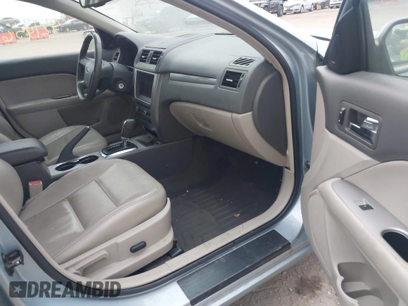 2010 Ford Fusion Hybrid z VIN 3FADP0L36AR200035, wystawiony jako IAAI lot #42145684 z przebiegiem 142 137 mil mil oraz . Historia ofert i sprzedaży dostępna na DreamBid. Obrazek 5.