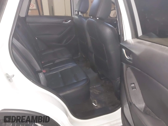 2013 Mazda CX-5 Grand Touring with VIN JM3KE4DE8D0147851, listed as a IAAI auction lot 41570695 with 94,648 mi miles. Bid and sale history available at carsss.com. Image 8.