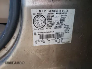 2004 Ford F-350 XL z VIN 1FTSW31P74EB59689, wystawiony jako Copart lot #87101184 z przebiegiem 240 134 mil mil oraz Szkoda całkowita • Salvage title. Historia ofert i sprzedaży dostępna na DreamBid. Obrazek 13.