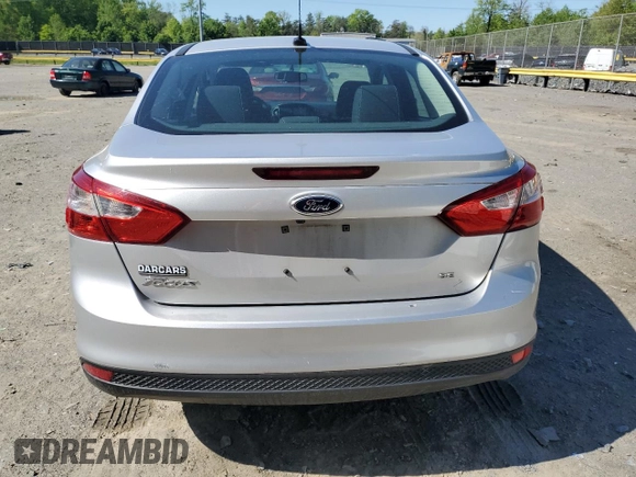 2013 Ford Focus SE with VIN 1FADP3F27DL207986, listed as a Copart auction lot 54608055 with 128,081 mi miles and Salvage title. Bid and sale history available at DreamBid. Image 6.