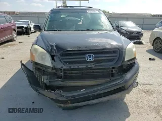 2005 Honda Pilot EX-L z VIN 5FNYF18635B001295, wystawiony jako Copart lot #52434555 z przebiegiem 318 797 mil mil oraz Szkoda całkowita • Salvage title. Historia ofert i sprzedaży dostępna na DreamBid. Obrazek 12.