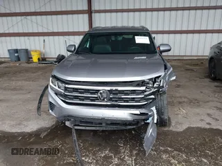 2023 Volkswagen Atlas SE z VIN 1V2HE2CA0PC222291, wystawiony jako IAAI lot #42431536 z przebiegiem 23 114 mil mil oraz . Historia ofert i sprzedaży dostępna na DreamBid. Obrazek 13.