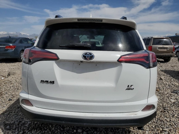 2017 Toyota RAV4 LE with VIN JTMBFREV1HD214337, listed as a Copart auction lot 52932765 with 23,959 mi miles and Salvage Title. Bid and sale history available at DreamBid. Image 6.
