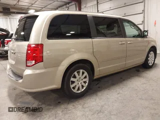 2013 Dodge Grand Caravan SXT with VIN 2C4RDGCG0DR567186, listed as a IAAI auction lot 41706119 with 112,512 mi miles and . Bid and sale history available at DreamBid. Image 4.