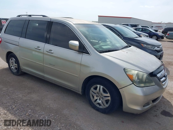 2005 Honda Odyssey EX with VIN 5FNRL38415B039809, listed as a IAAI auction lot 41884459 with 231,258 mi miles. Bid and sale history available at carsss.com. Image 1.