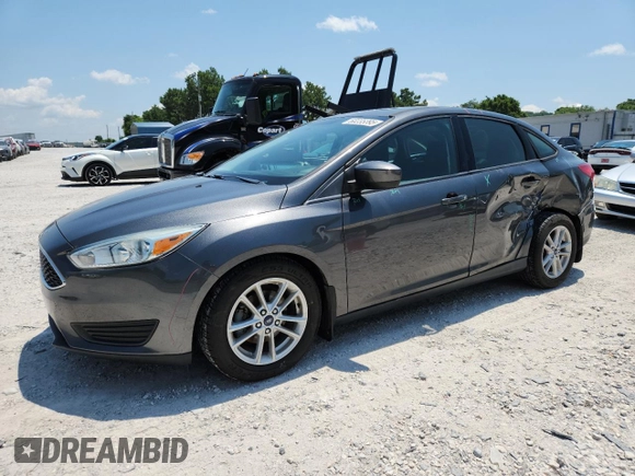 2018 Ford Focus SE with VIN 1FADP3F25JL331038, listed as a Copart auction lot 60235395 with 37,038 mi miles and Salvage title. Bid and sale history available at DreamBid. Image 1.