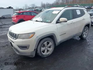 2019 Jeep Compass Latitude with VIN 3C4NJDBB7KT703593, listed as a IAAI auction lot 41490224 with 99,640 mi miles. Bid and sale history available at carsss.com. Image 17.
