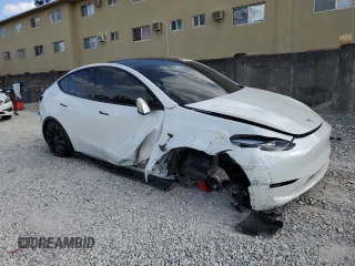 2024 Tesla Model Y Performance with VIN 7SAYGDEF3RF050704, listed as a Copart auction lot 45512455 with 15,539 mi miles and Salvage Title. Bid and sale history available at DreamBid. Image 4.