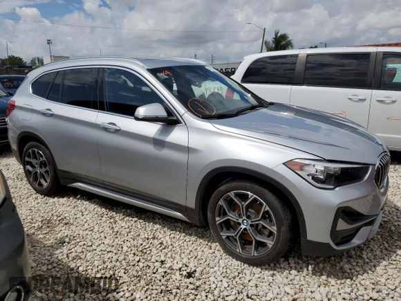 2021 BMW X1 sDrive28i with VIN WBXJG7C04M5S29295, listed as a Copart auction lot 48922203 with 14,214 mi miles. Bid and sale history available at carsss.com. Image 4.