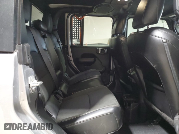 2021 Jeep Gladiator Freedom с VIN 1C6HJTAG2ML579159, выставлен на аукционе Copart как лот 42954605 с пробегом 66 865 миль миль и Списание • Salvage title. История ставок и продаж доступна на DreamBid. Изображение 10.