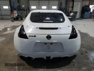 2012 Nissan 370Z z VIN JN1AZ4EH2CM564443, wystawiony jako Copart lot #45126885 z przebiegiem 71 729 mil mil oraz Szkody całkowita. Historia ofert i sprzedaży dostępna na DreamBid. Obrazek 6.