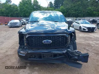2023 Ford F-150 XL with VIN 1FTEW1CP3PKE31756, listed as a IAAI auction lot 42242178 with 15,370 mi miles and . Bid and sale history available at DreamBid. Image 18.