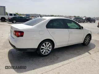 2010 Volkswagen Jetta Wolfsburg Edition with VIN 3VWRA7AJ0AM156555, listed as a Copart auction lot 56982155 with 72,054 mi miles and Salvage title. Bid and sale history available at DreamBid. Image 3.