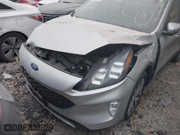 2020 Ford Escape Titanium с VIN 1FMCU9J96LUB18419, выставлен на аукционе IAAI как лот 40612100 с пробегом 40 041 миль миль и . История ставок и продаж доступна на DreamBid. Изображение 6.