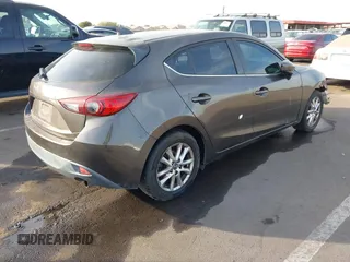 2015 Mazda 3 i Touring with VIN 3MZBM1L74FM236410, listed as a IAAI auction lot 41339253 with 119,731 mi miles and . Bid and sale history available at DreamBid. Image 4.