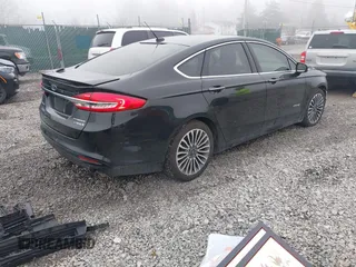 2018 Ford Fusion Titanium with VIN 3FA6P0RU7JR182119, listed as a IAAI auction lot 41984816 with 146,748 mi miles and . Bid and sale history available at DreamBid. Image 4.