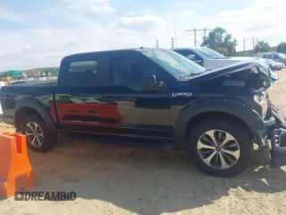 2019 Ford F-150 XL with VIN 1FTEW1C51KFB59272, listed as a IAAI auction lot 41620215 with 132,134 mi miles and . Bid and sale history available at DreamBid. Image 13.