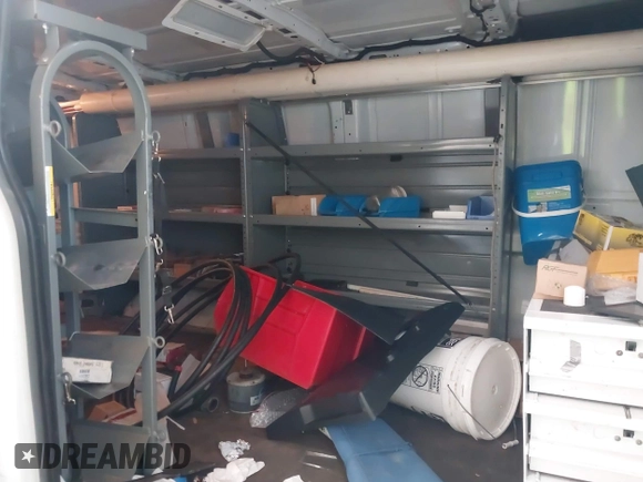 2016 Ford Transit Cargo z VIN 1FTYR2ZM6GKA03946, wystawiony jako IAAI lot #42590477 z przebiegiem 163 710 mil mil oraz . Historia ofert i sprzedaży dostępna na DreamBid. Obrazek 8.