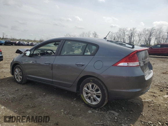2011 Honda Insight EX with VIN JHMZE2H75BS008221, listed as a Copart auction lot 51910115 with 82,670 mi miles and Salvage Title. Bid and sale history available at DreamBid. Image 2.