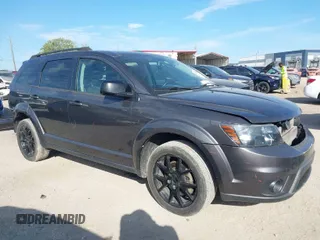 2015 Dodge Journey SXT with VIN 3C4PDCBB0FT708859, listed as a IAAI auction lot 41898650 with 180,018 mi miles. Bid and sale history available at carsss.com. Image 1.